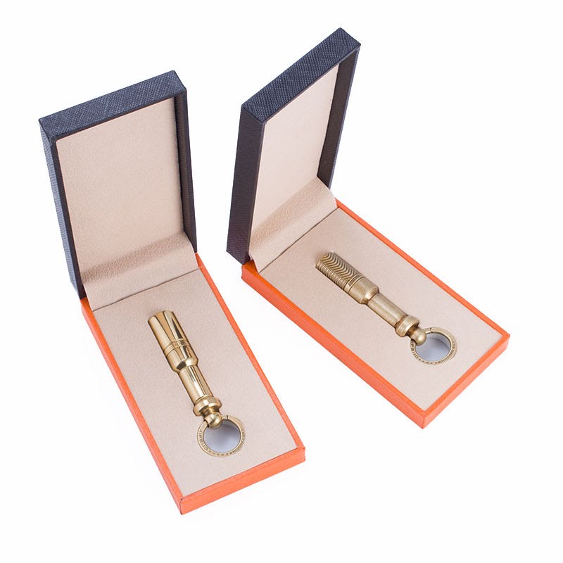 Portable cigar punch cutter attached to keychain - precise and clean cigar opening tool